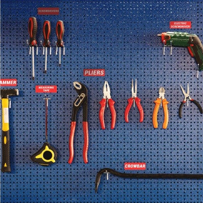 Small engraved plastic signs used to label tools