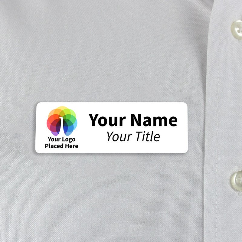 White 1x3  inch name tag - sample template - worn on a off-white dress shirt for size perspective