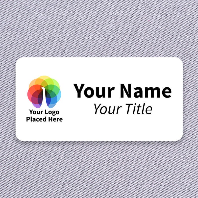 A Full Color Custom Name Tag - 1.5" x 3" on a off-white material background