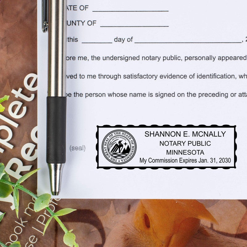 Minnesota Notary Pink Stamp - Rectangle Imprint Example on a document