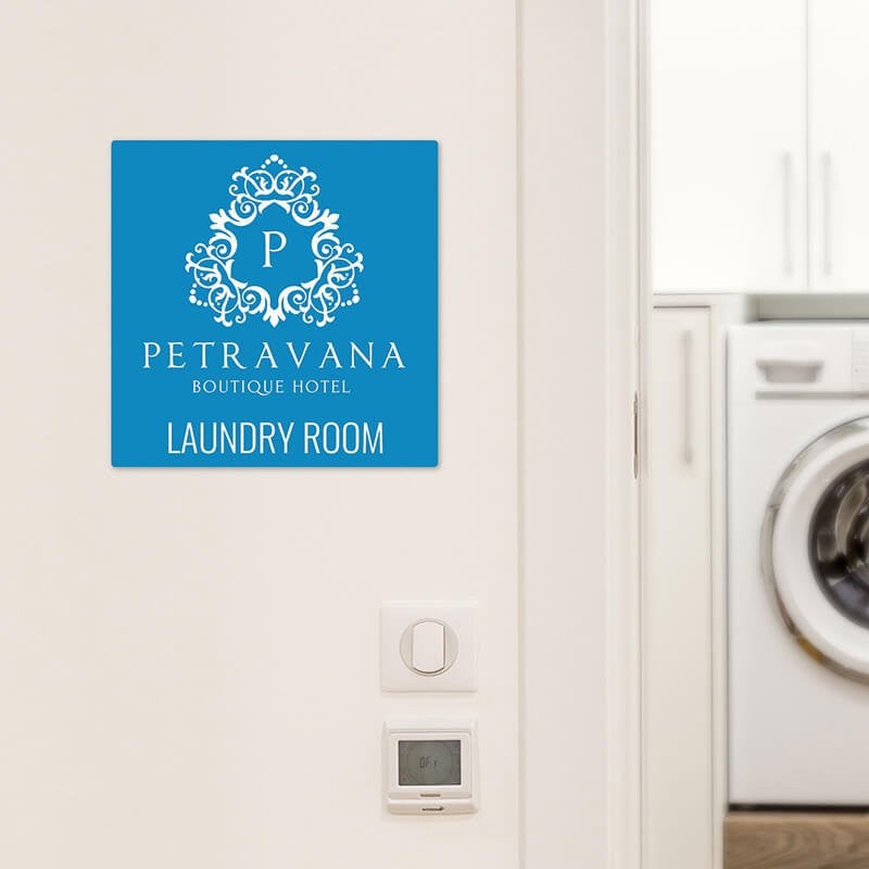 Engraved plastic sign for a laundry room