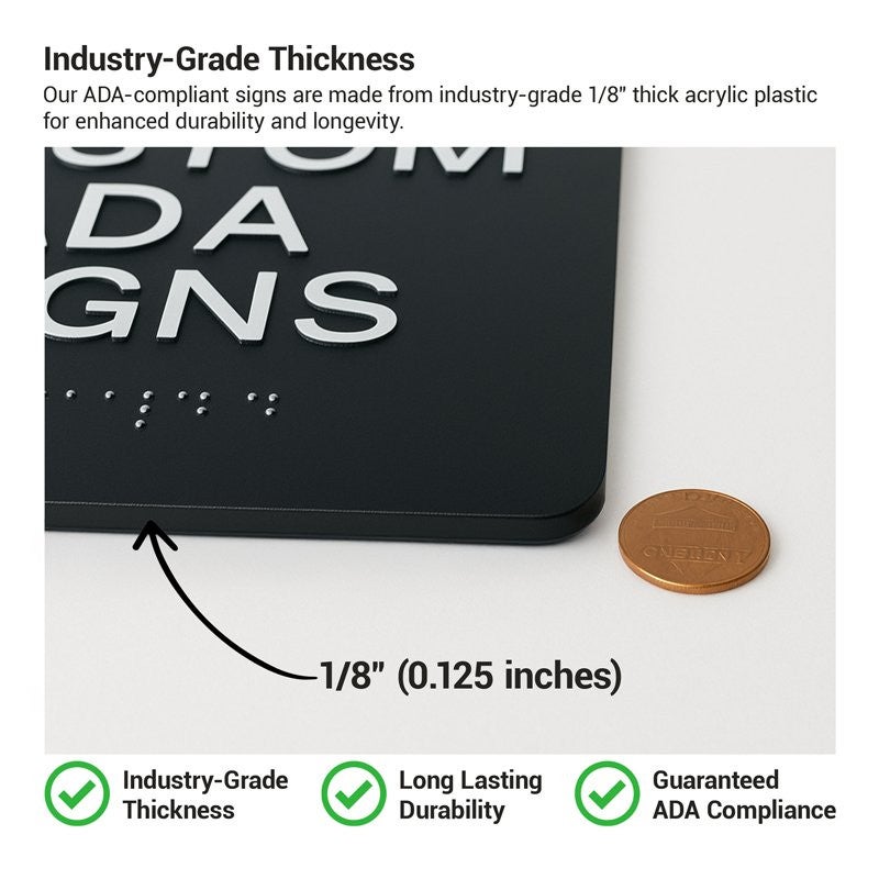 The 1/8th-inch thickness of the ADA sign compared to a penny