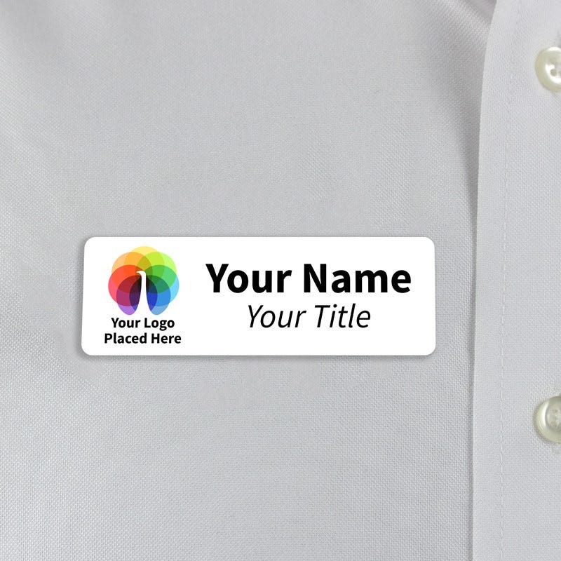 A Full Color Custom Name Tag - 1" x 3" on a off-white material background