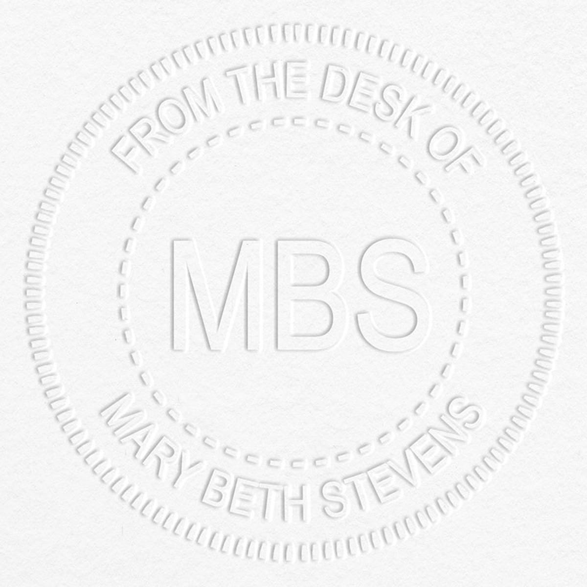 Custom Initial From the Desk of Embosser impression on grey paper