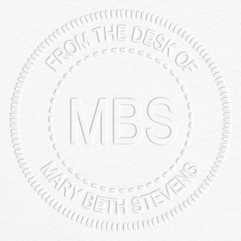 Custom Initial From the Desk of Embosser impression on grey paper