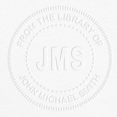 Example of From the Library Initials Personalized Book Embosser Imprint on grey paper