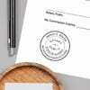 Depiction of Alaska Notary Pink Stamp Impression on Paper