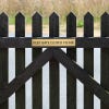 2x12 custom engraved brass sign on a fence