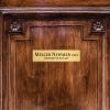 2x8 custom brass sign displayed on a door