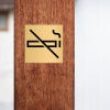 2x2 custom engraved brass sign with a no smoking icon
