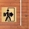 4x4 custom engraved brass sign displayed on a wall