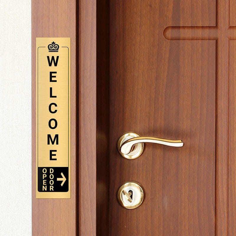 14x3 custom engraved brass sign next to a door
