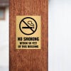 4x3 custom engraved brass sign displayed on a pillar 