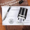 Arizona notary public stamp on affidavit with record book, pen, and self-inking stamp.