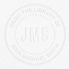 Example of From the Library Initials Personalized Book Embosser Imprint on grey paper