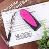 Oregon Notary Pink Stamp Flat lay on document