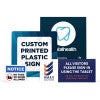 Various printed plastic sign sizes displayed next to each other