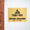 6x8 custom engraved sign displayed by a door