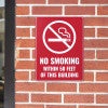A red engraved no smoking sign