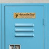 2x8 printed brass sign displayed on a locker 