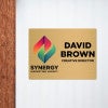 6x8 printed brass sign displayed next to a doorway