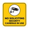 Yellow No Soliciting sign reading "Security Cameras in Use" with a security camera icon