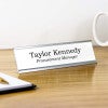 Taylor Kennedy in Modern Signature Style, White With Black Letters Desk Plate on Clean Office Table