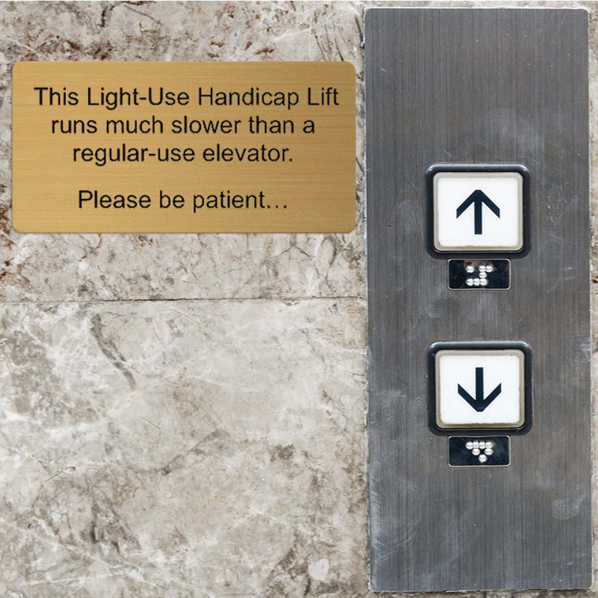 Engraved Brass Plate Giving A Notice For A Handicap Elevator