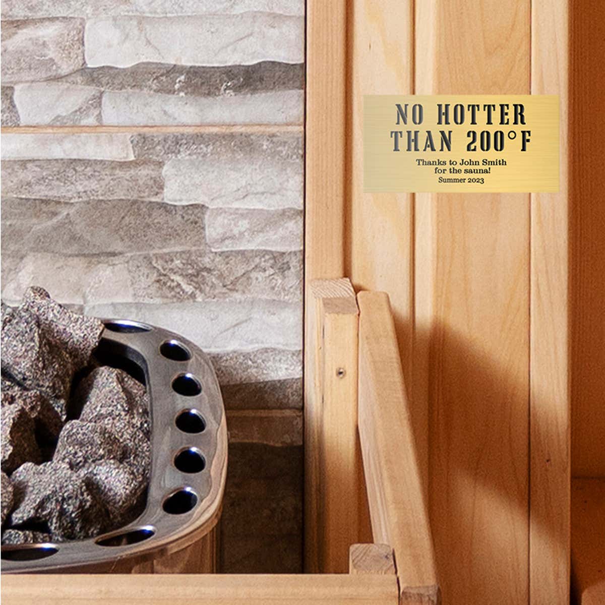 Custom Engraved Brass Sign Displayed by a Sauna Saying No Hotter Than 200 Degrees