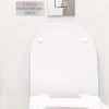 Silver Plastic Sign With Red and White Text Saying ATTENTION Only flush toilet paper