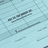 Pay to the Order of with Signature Space Financial Stamp in Use