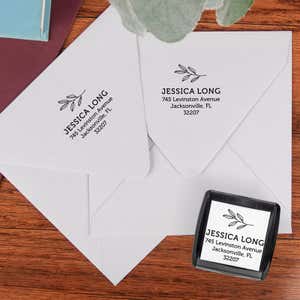 Address stamp impression on two envleopes