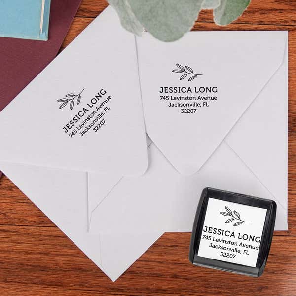 Address stamp impression on two envleopes